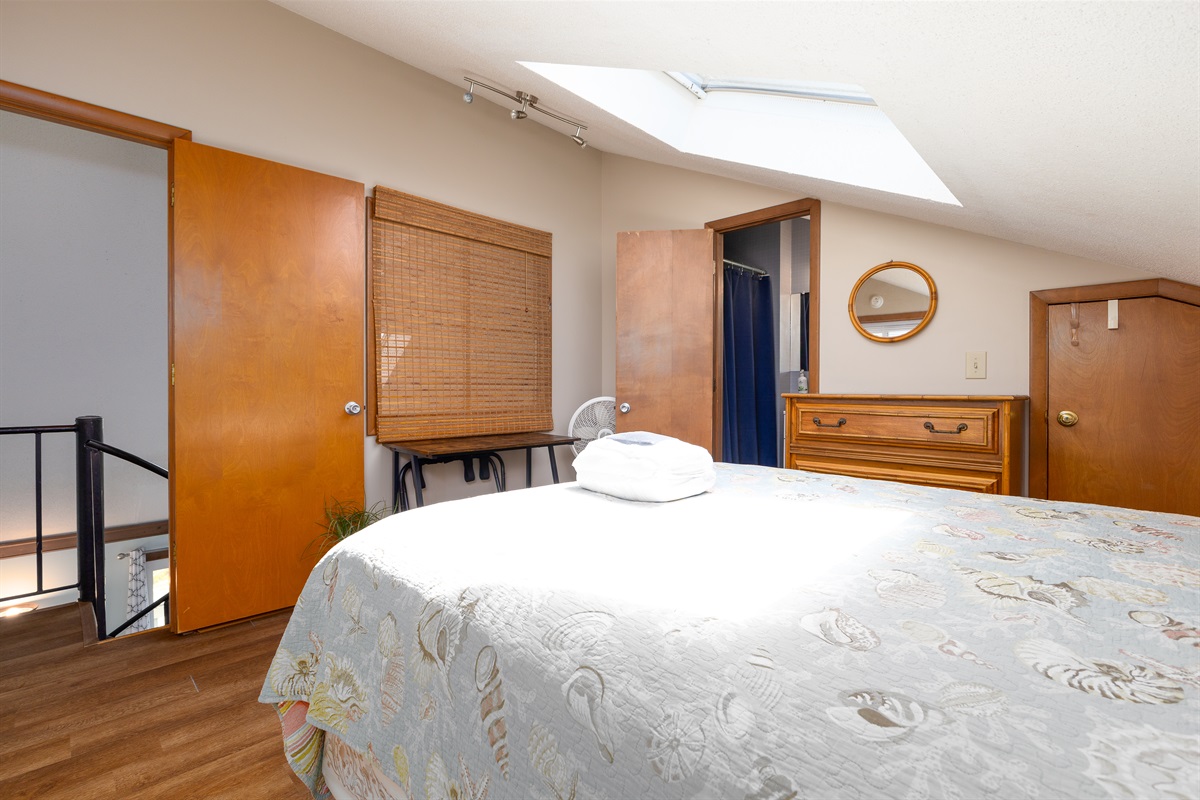 Queen-size bed in Loft bedroom