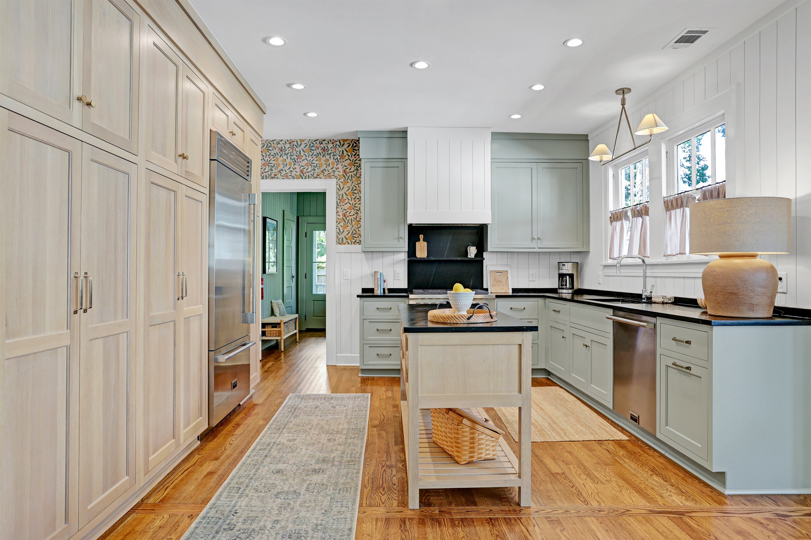 A beautiful blend of form and function, the kitchen was designed with both aesthetics and efficiency in mind.