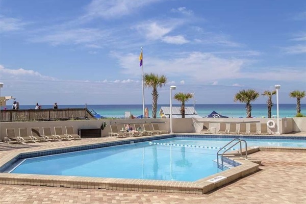 Pool by beach at condo