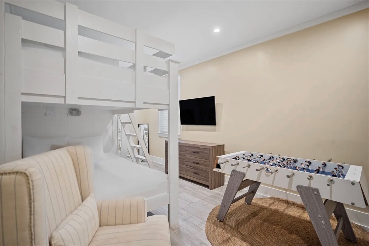 1st Floor BUNK ROOM with Queen/Queen Bunk Bed, Full/Full Bunk Beds, Foosball Table, Smart TV, Game Console with pre-loaded games – perfect for the kids!