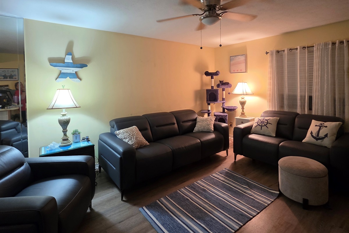 Newly Updated Leather Recliner,  Sofa with Recliner on each side and stationary loveseat.