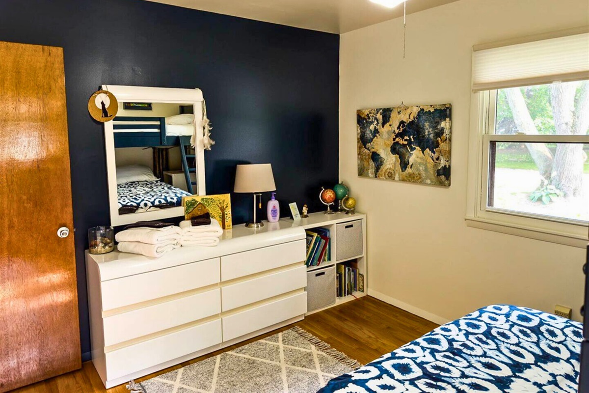 There's Also a Dresser and Mirror in the First Bedroom