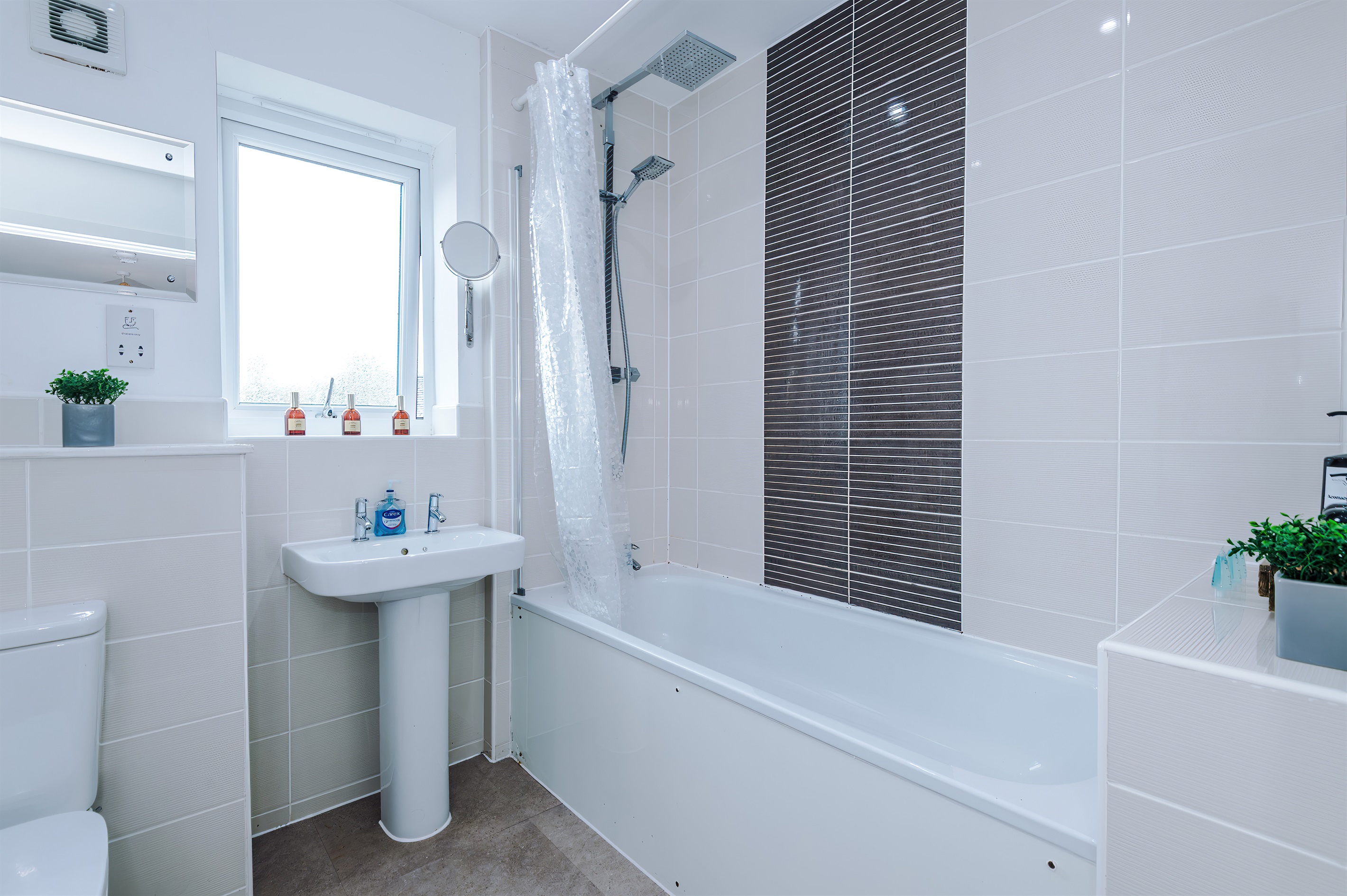 The family bathroom benefits from a Bidet, Toilet, Basin, Shower and Bath