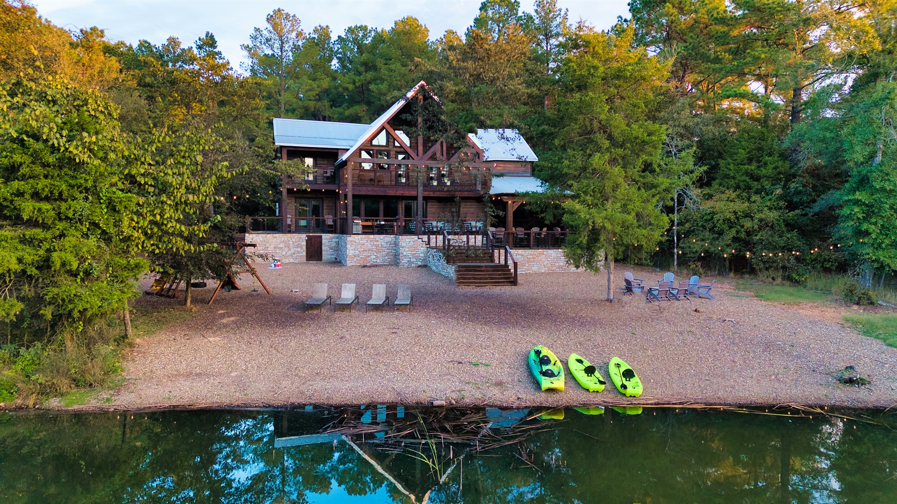 Expansive decks, peaceful pond views, and endless sunsets—your Hochatown getaway starts here