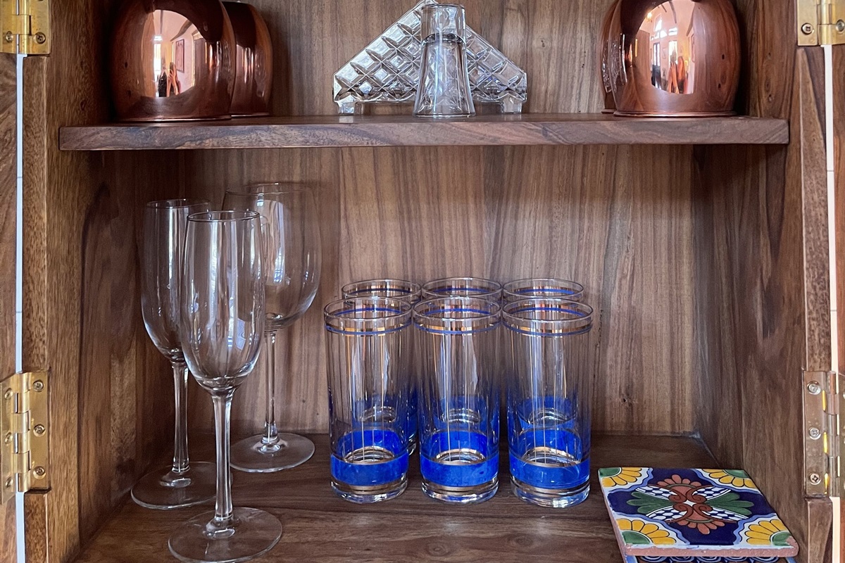 Belly up to the bar. Shake your favorite cocktail or pour a glass of bubbly to enjoy.