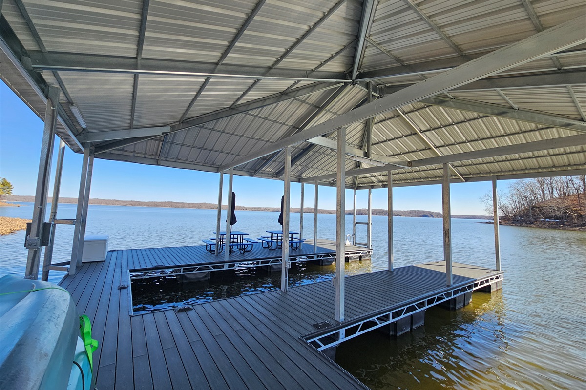 Spacious covered dock with open lounge area
