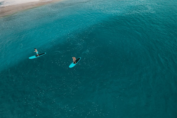 Paddle boarding off the Beach Club