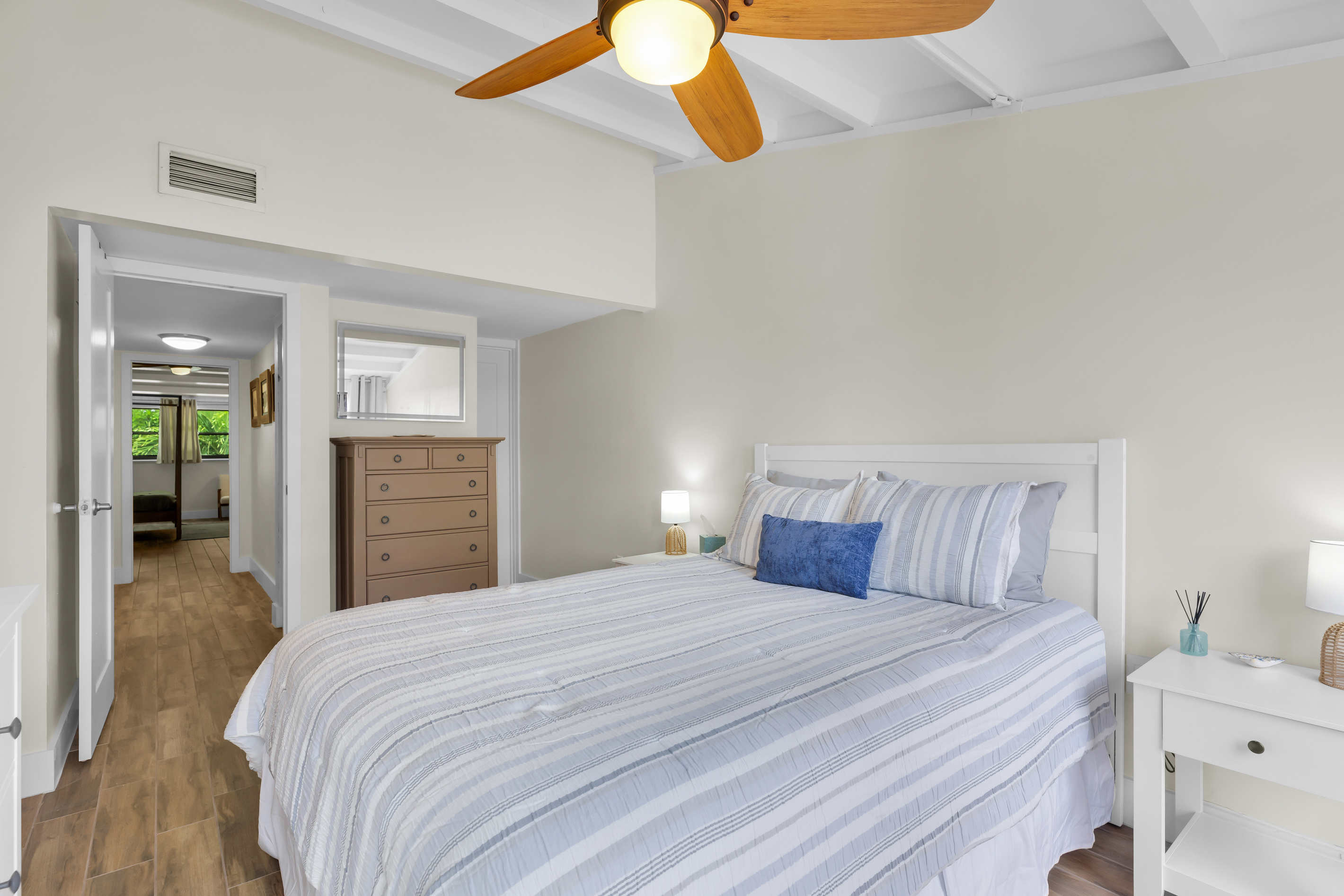 Upstairs guest bedroom with queen bed