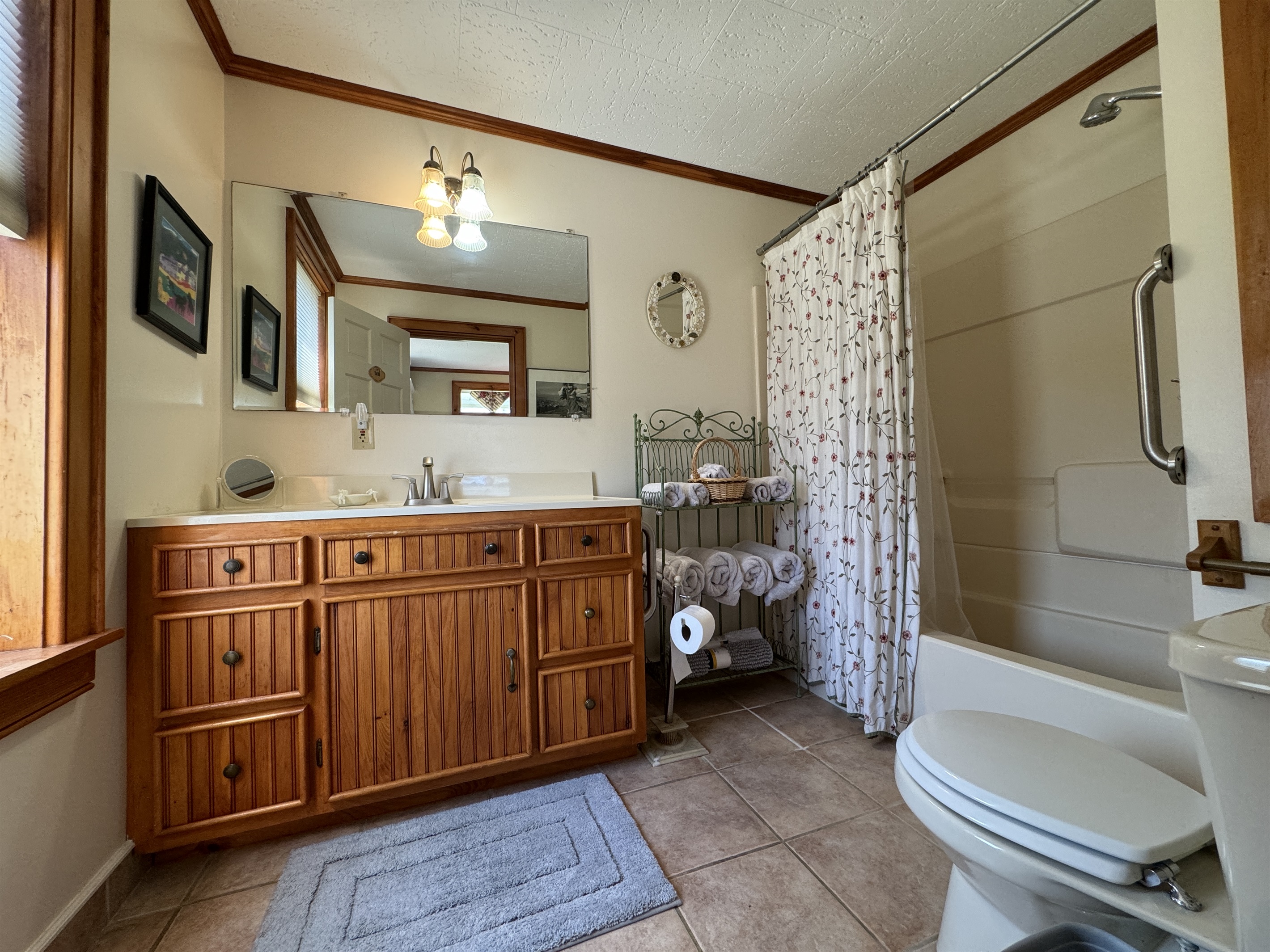 Bathroom with tub/shower off kitchen