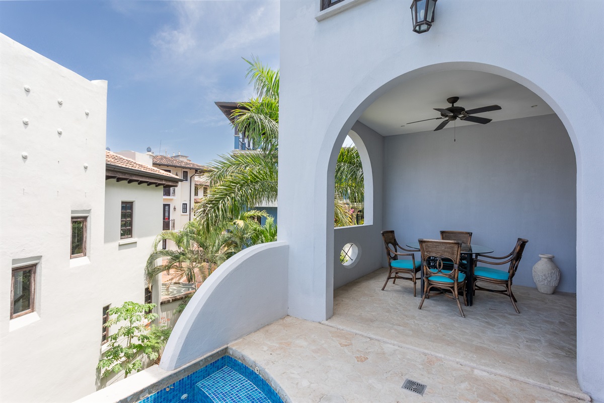 Covered outdoor dining with ocean views and plunge pool