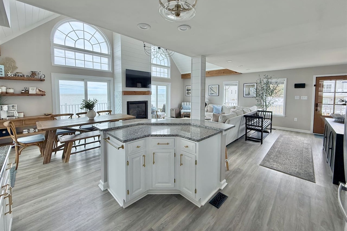 Step into this expansive, open-concept haven designed for shared joy. With its seamless flow from the modern kitchen to the inviting living area, it is the perfect destination for friends and family to relax and vacation in style.