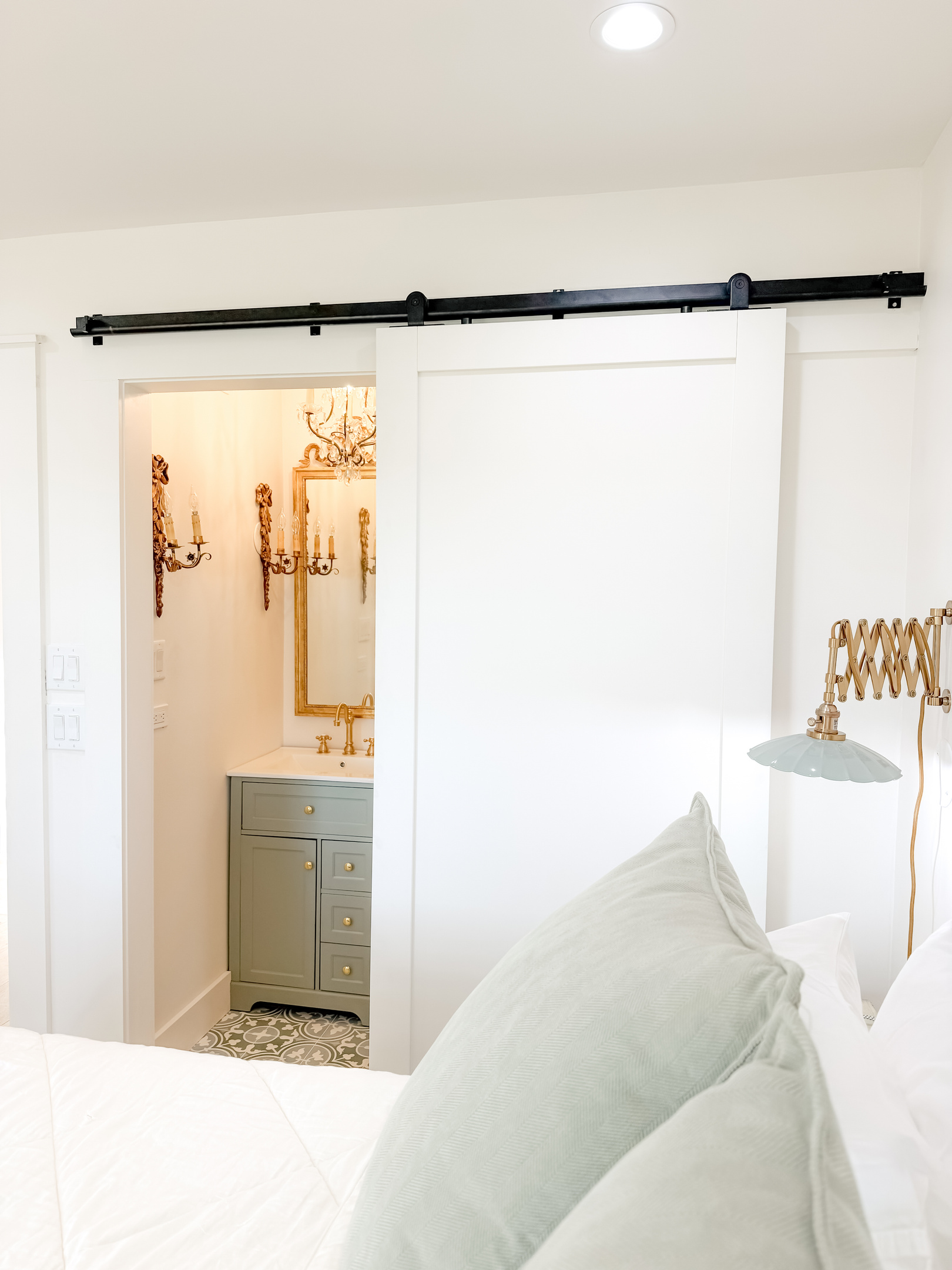 Bright and inviting main bedroom with a queen bed and natural light.