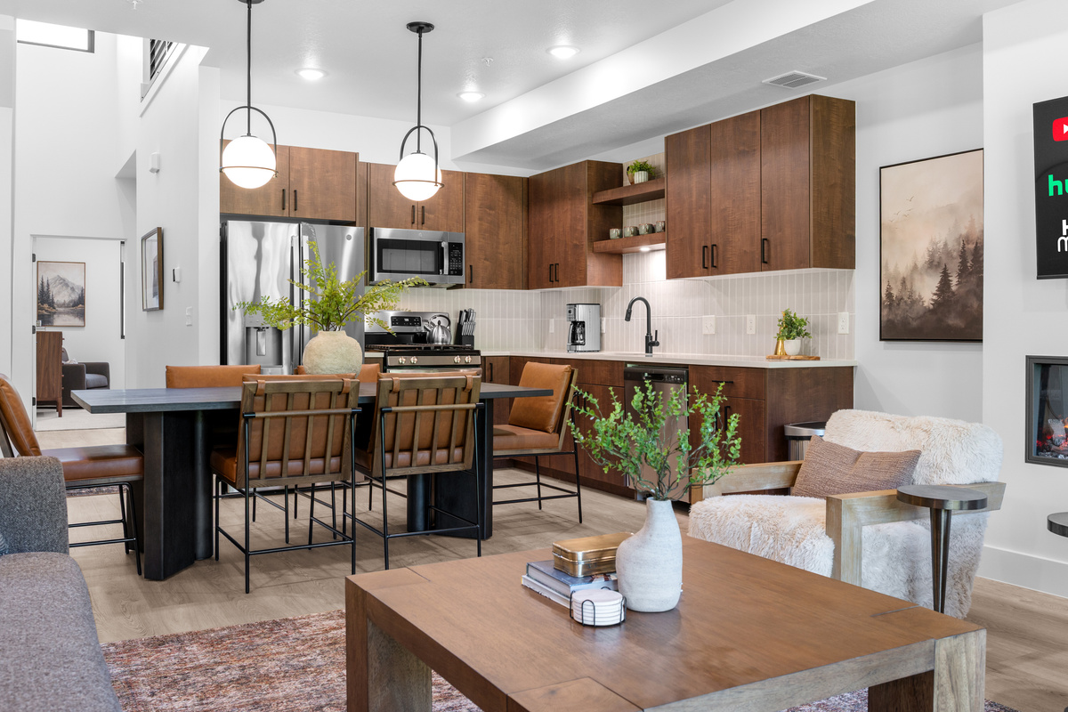 Open floor plan seamlessly connects the kitchen, dining, and living spaces.