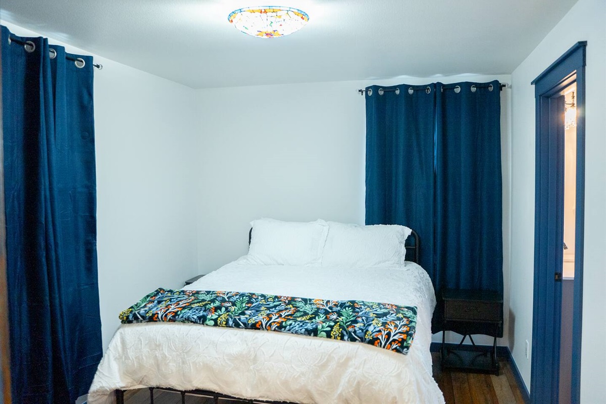 Queen Bed with private bathroom.