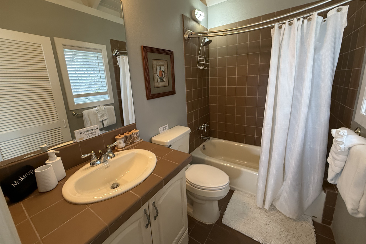 Convenient private bathroom with a comfortable, welcoming feel.