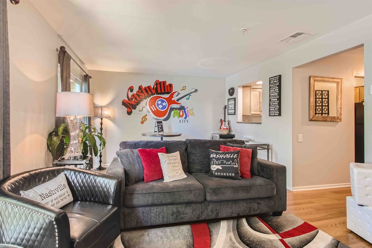 Spacious living room with queen sleeper sofa.