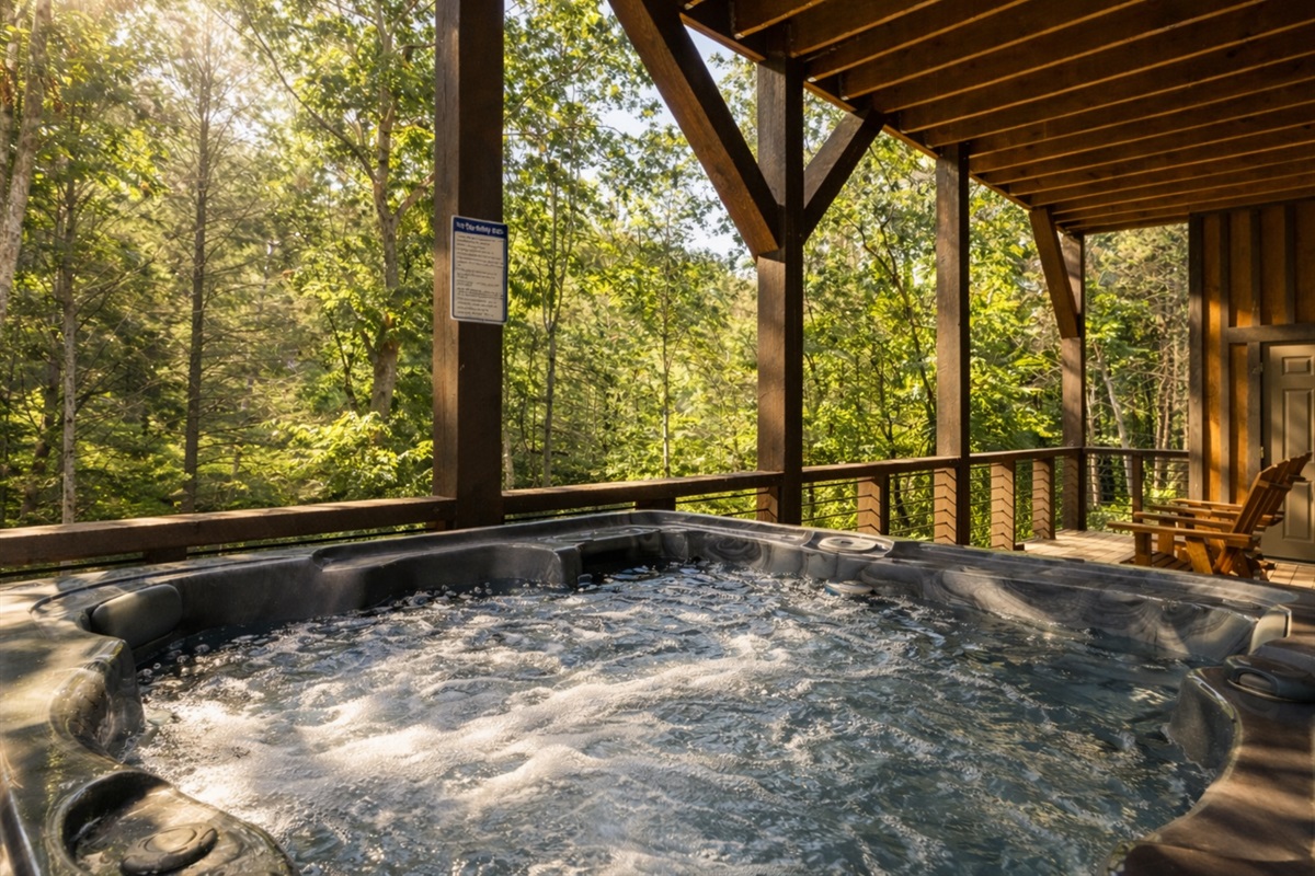 The bubbling hot tub offers a relaxing escape, perfect for unwinding under the stars.