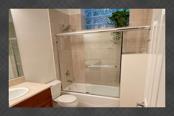 Bathroom with fresh towels and guest essentials provided