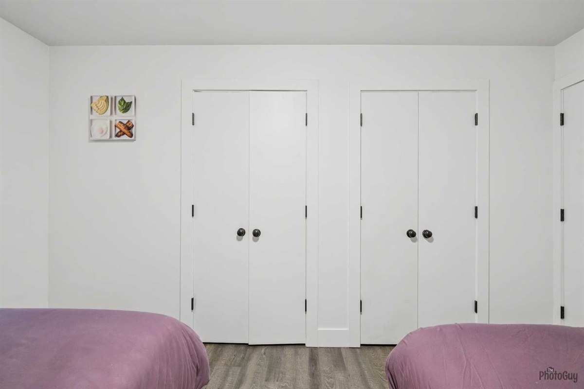 Double queen bedroom with closets