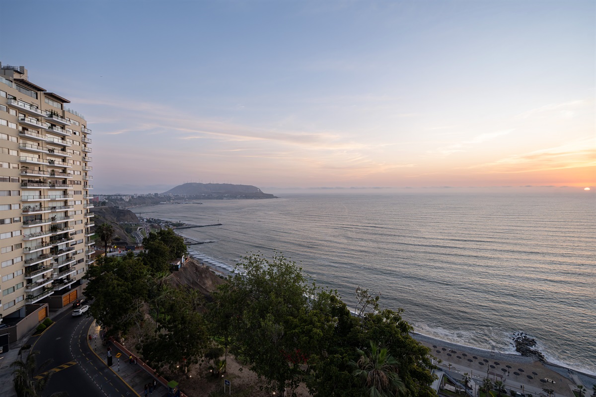 Golden Hour Master Suite: Experience breathtaking front-row sunset views right from your King-size bed, where the sky meets the Pacific in a display of orange and gold