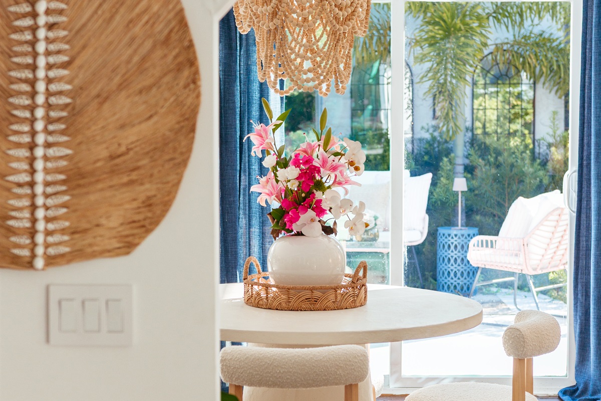 As you journey from the front of the house to the rear, a lovely, tasteful bar area awaits your visit - where many conversations and drinks can be had together.