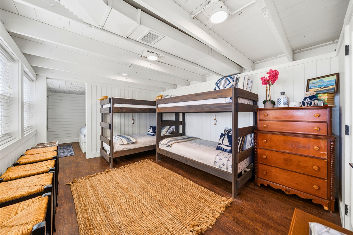 Make use of this bunk-style room where the layout is both fun and functional, offering a comfortable place for groups to rest after a full day.