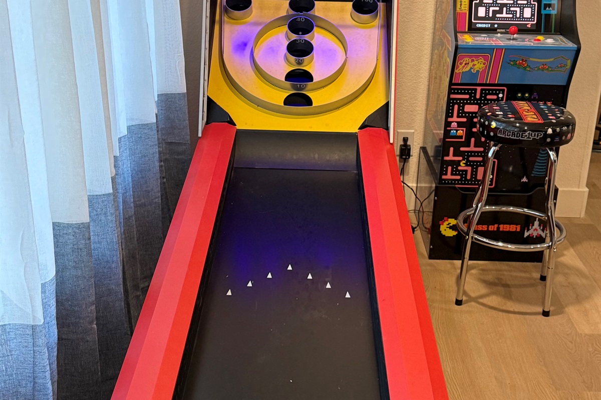 Game room features old time skee ball, Ms PacMan; plus an air hockey table and shuffleboard table (not pictured)