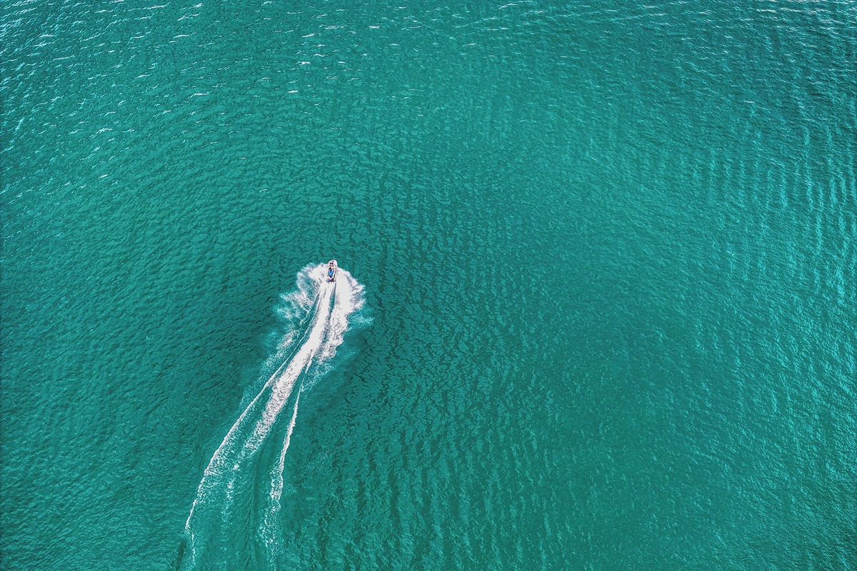 Aerial View Of The Crystal Clears Waters In Front Of The Dock