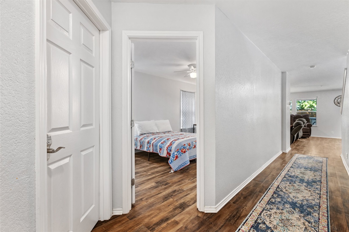 Hardwood floors flow throughout the home connecting main living spaces and leading upstairs to all 4 bedrooms. Clean, bright layout designed for groups traveling together in Northeast San Antonio.