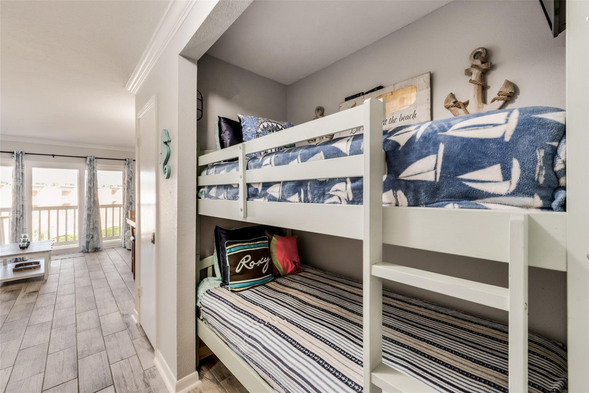 True twin bunks built in to the hallway alcove
