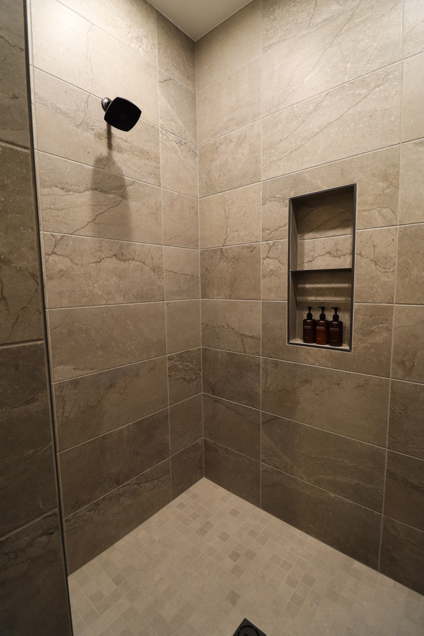 Downstairs primary walk in shower.