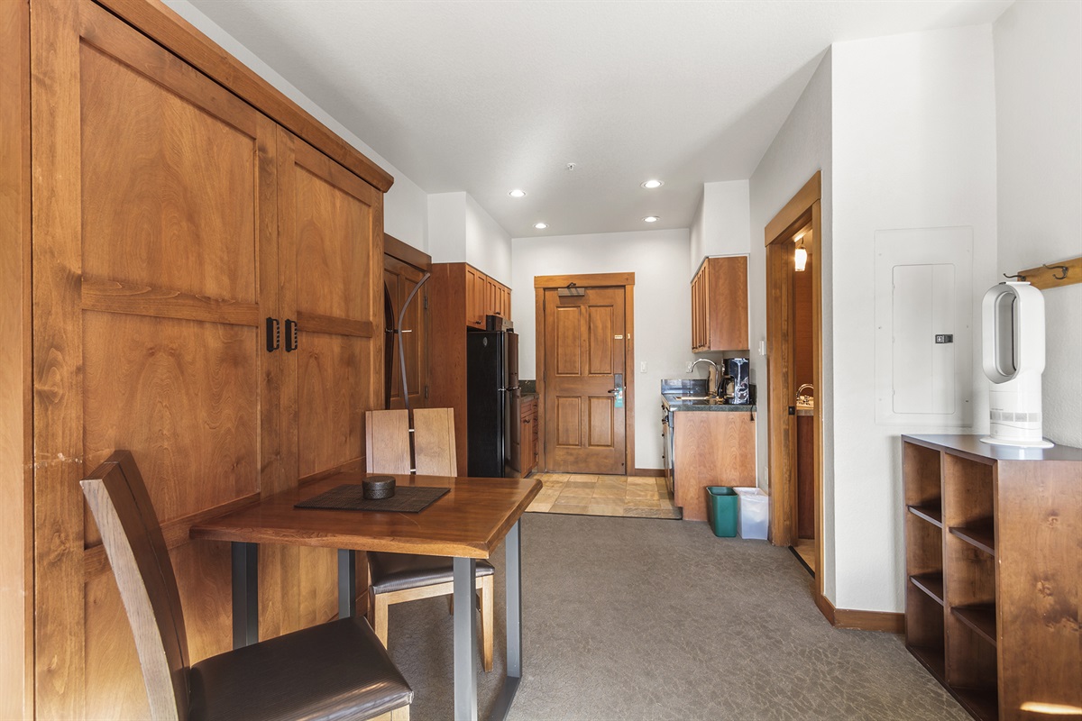 Dining area in front of Queen Murphy bed