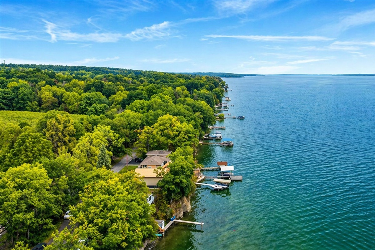 Enjoy a private lakeside experience with stunning views that stretch as far as the eye can see. The serene atmosphere is ideal for relaxing and enjoying the tranquility of the Finger Lakes. ️