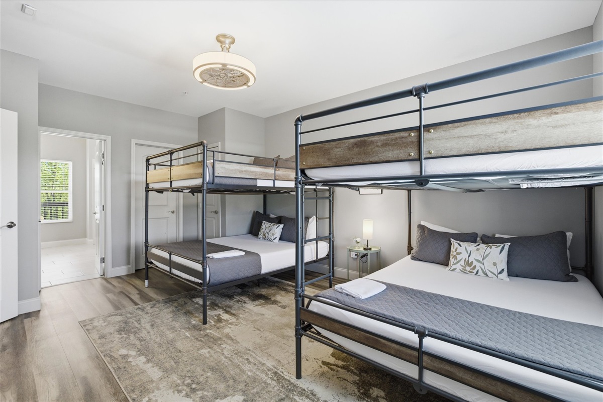 Pick your bunk, claim your corner, and settle in—this room was made for group trips. Two queen-over-queen bunks mean everyone gets a real bed, not a backup plan. Drop your bags, kick off your shoes, and make it your space.