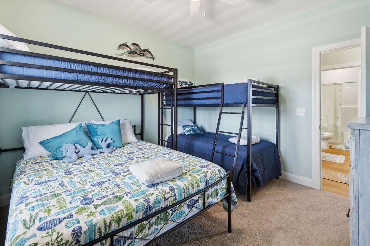 Fun kids&rsquo; room with queen bed, bunk beds, and private ensuite bathroom