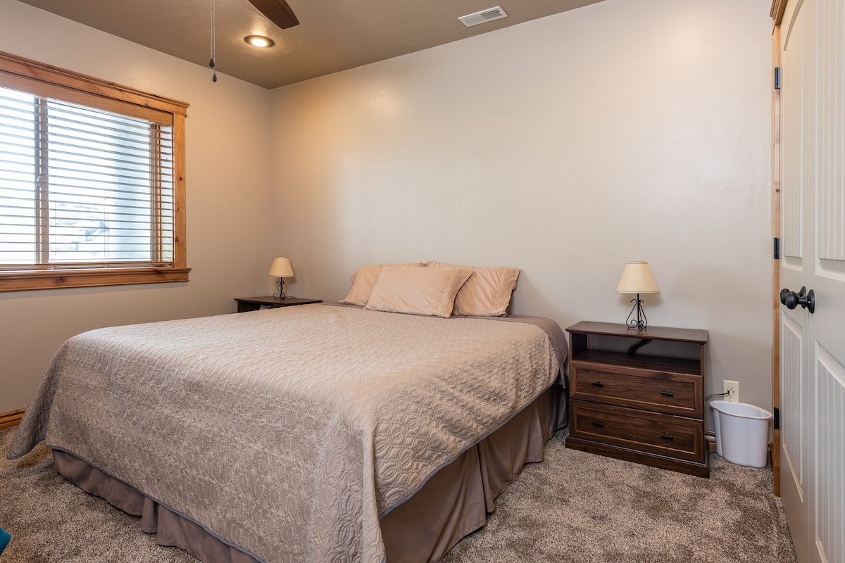 Feel at home in this basement room with a king-size bed.