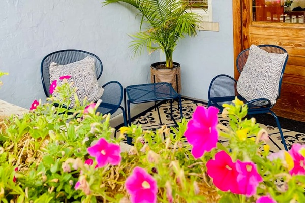 Private outdoor patio with comfortable seating, ideal for morning coffee, relaxed evenings, or stepping outside without leaving the property.