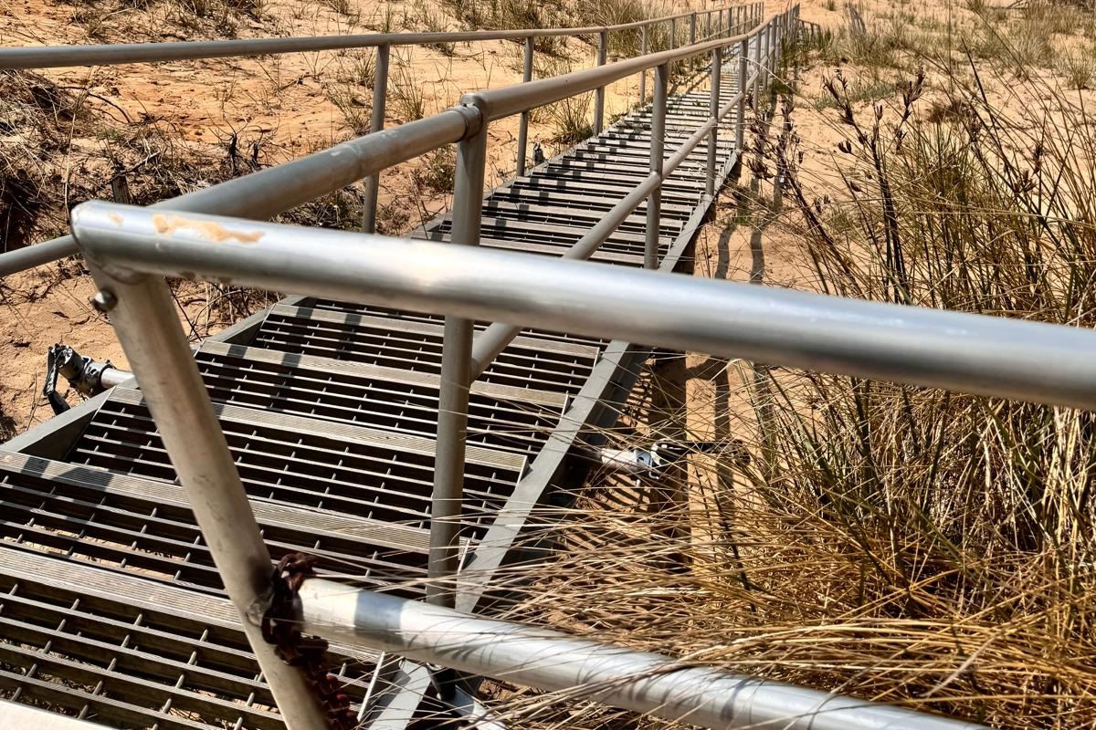 There are about 90 steps down to our beach. There is also a public beach just a short walk or drive south from our property with no stairs required.