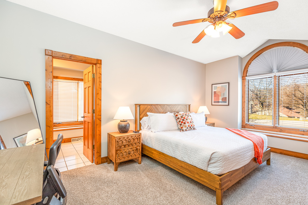 The Primary Bedroom has a king bed with full ensuite bathroom, one of two bedrooms located on the main floor.