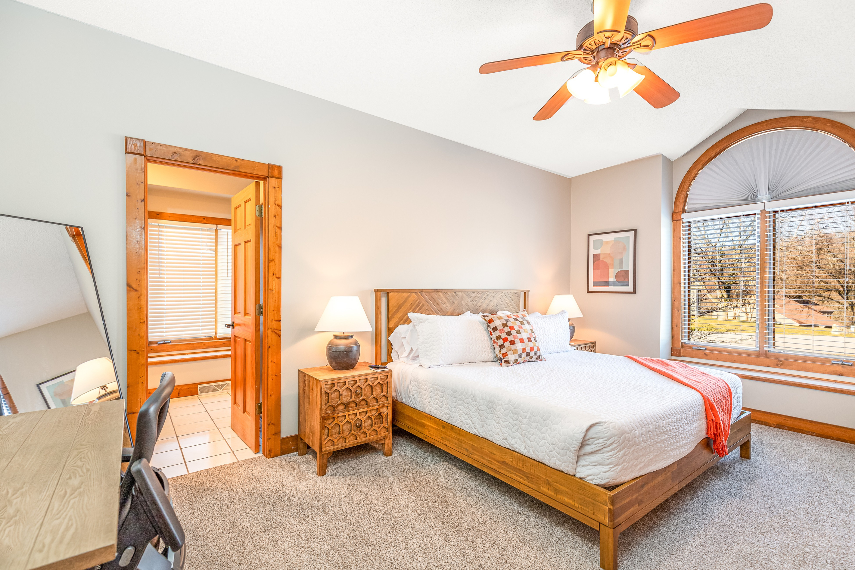 The Primary Bedroom has a king bed with full ensuite bathroom, one of two bedrooms located on the main floor.