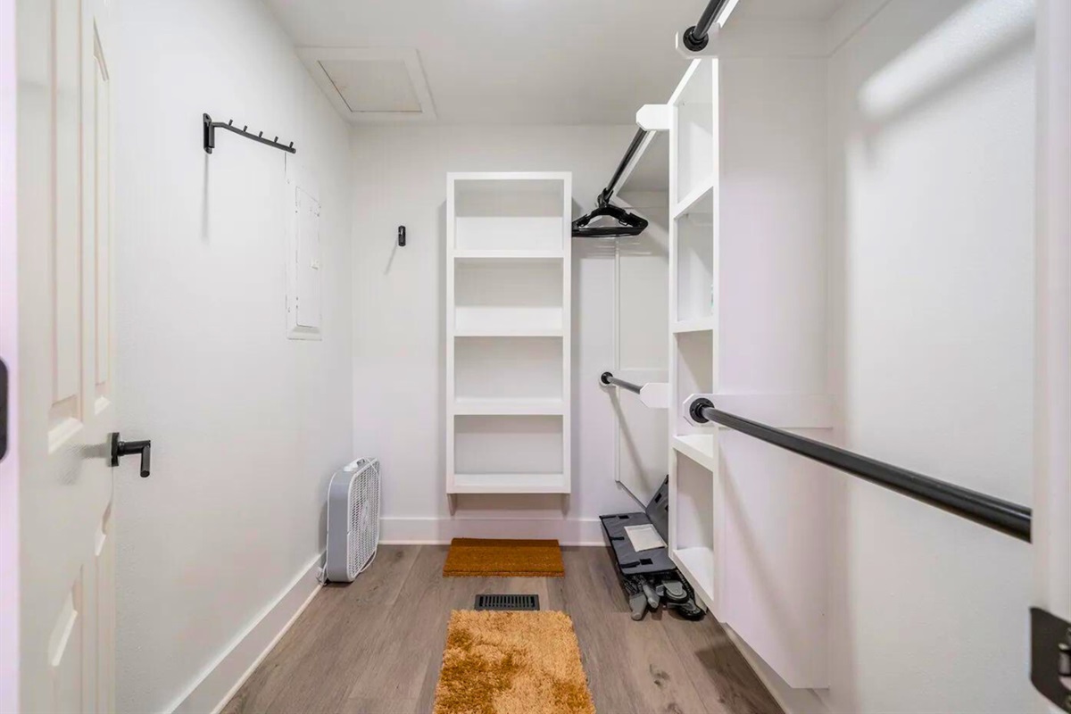 [Primary Closet] The Primary Bedroom Also has a Large Closet, Perfect for Suitcase Storage!