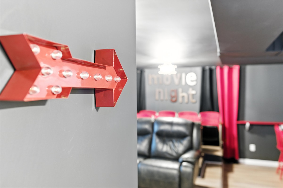 Cozy up in the movie room—your personal theater experience