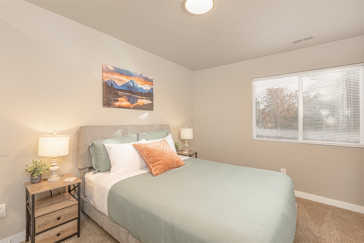 3008 Regan – Bedroom One
Cozy bedroom with comfortable bedding and natural light.