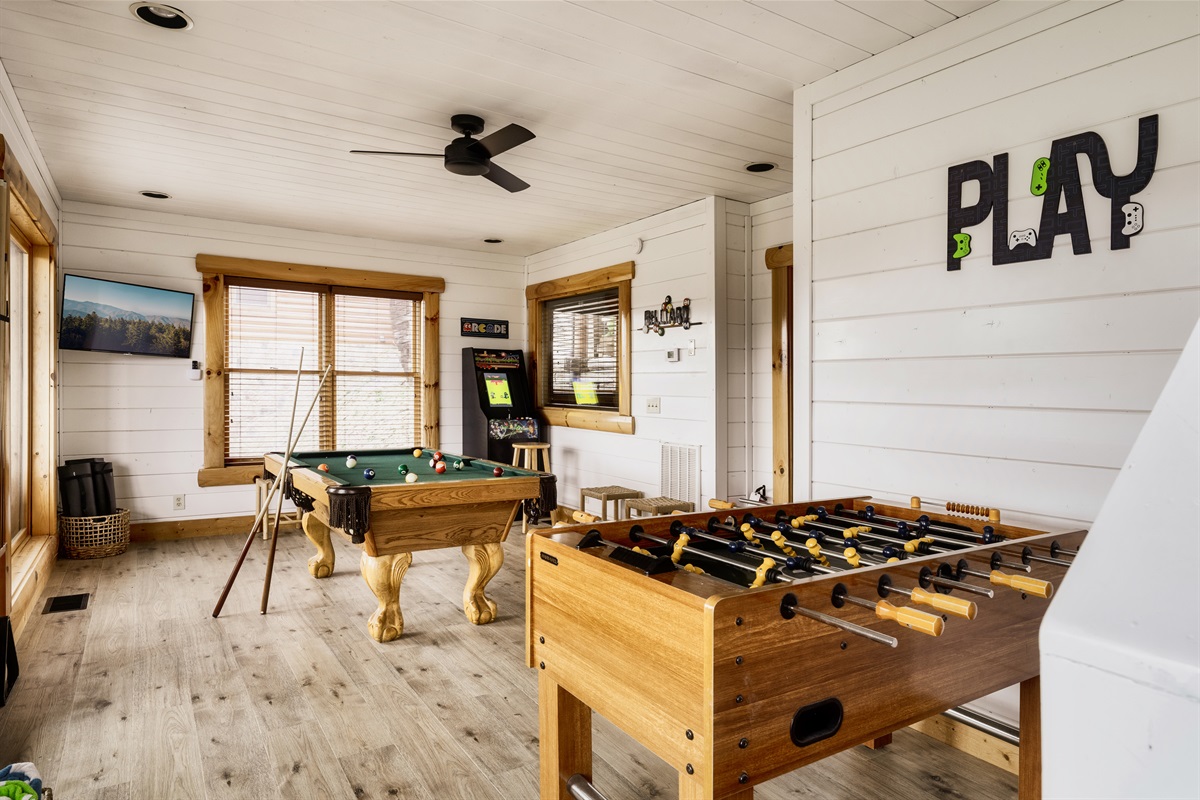 Embrace the playful vibes in our ultimate game room, where foosball and billiards meet for endless fun and laughter! Let the games begin!