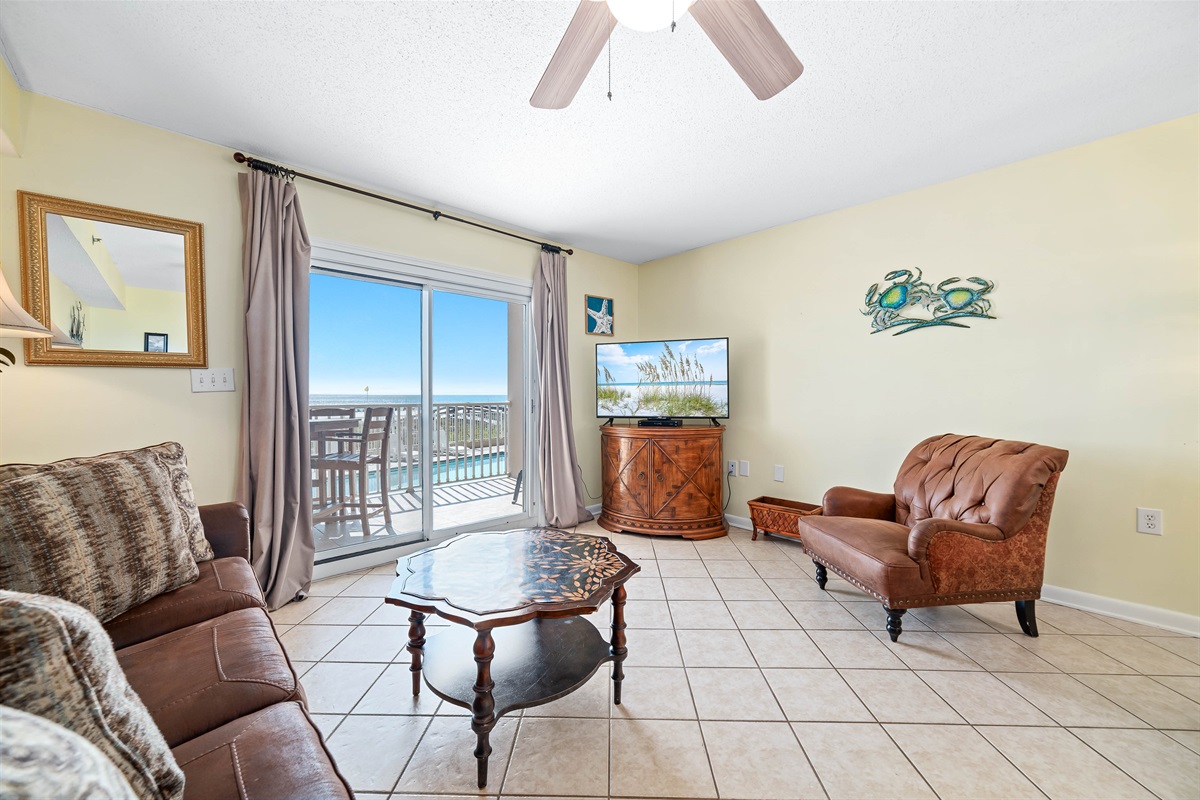 Experience coastal comfort in this beautifully appointed living room. Featuring a plush sleeper sofa for extra guests and direct access to your private balcony overlooking the serene waters.
