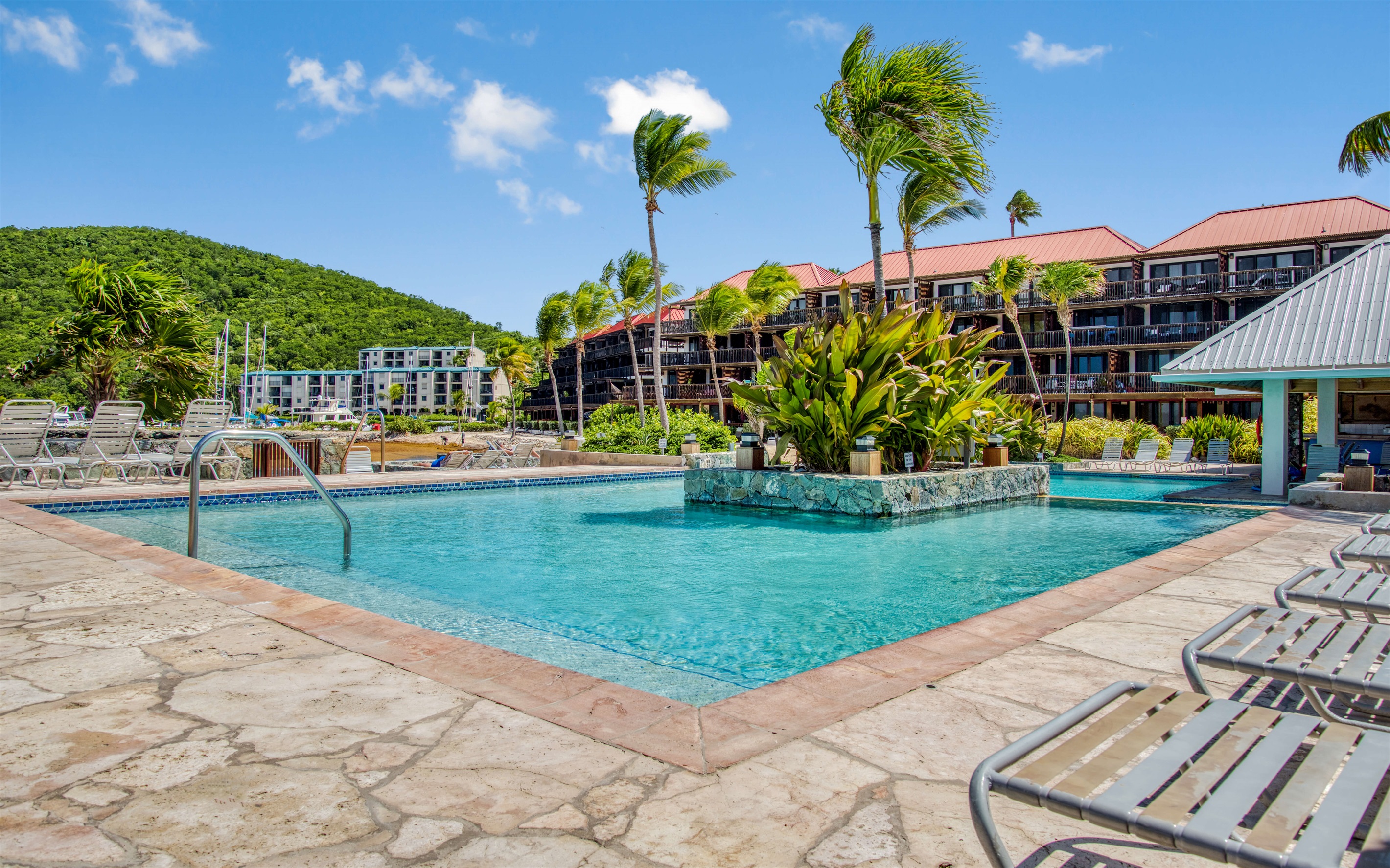 Resort style pool, just steps from the condo