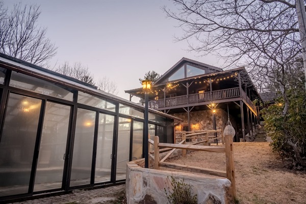 View of cabin from pool house