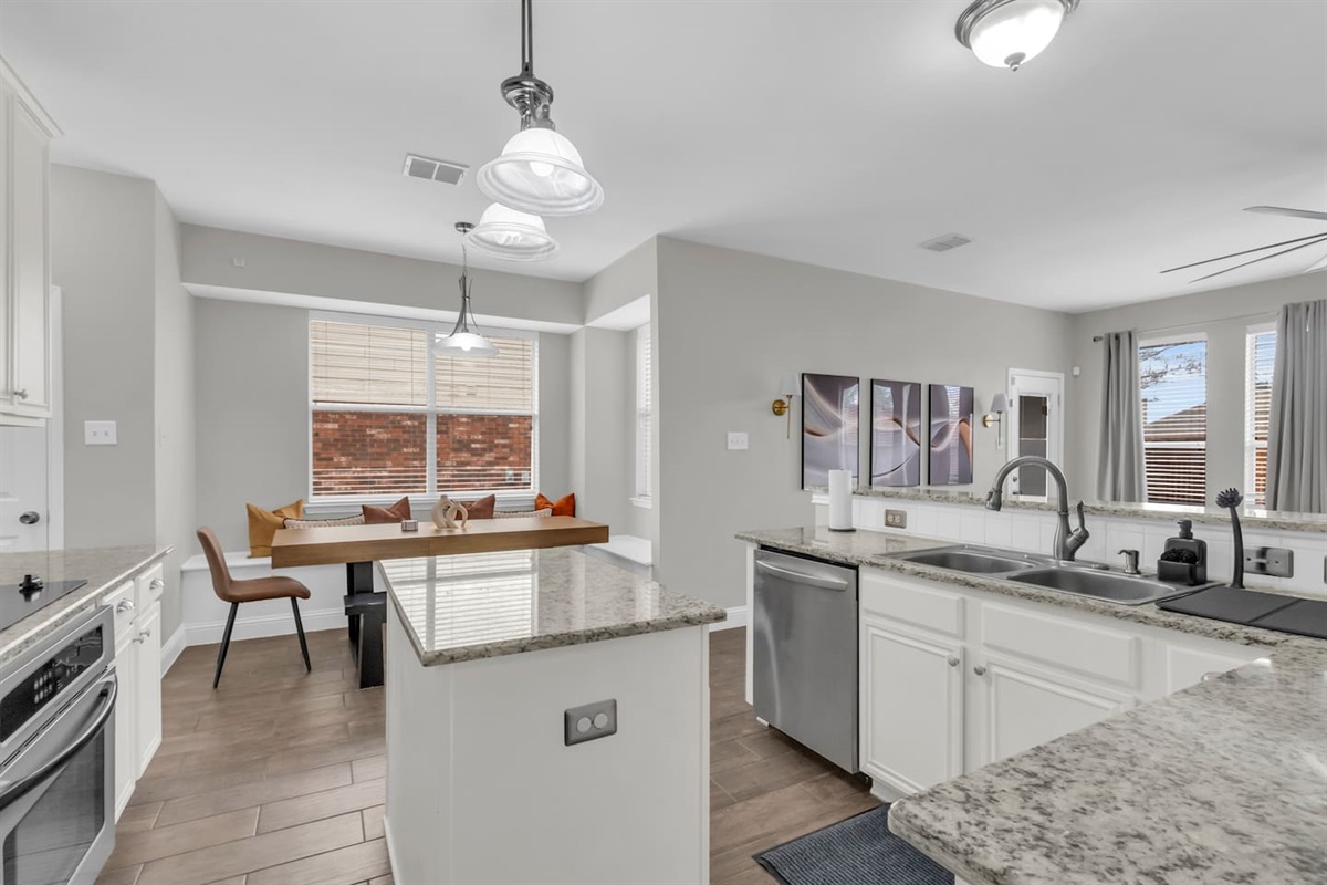 Spacious, open-concept kitchen designed for group cooking, casual meals, and seamless flow into the dining and living areas.