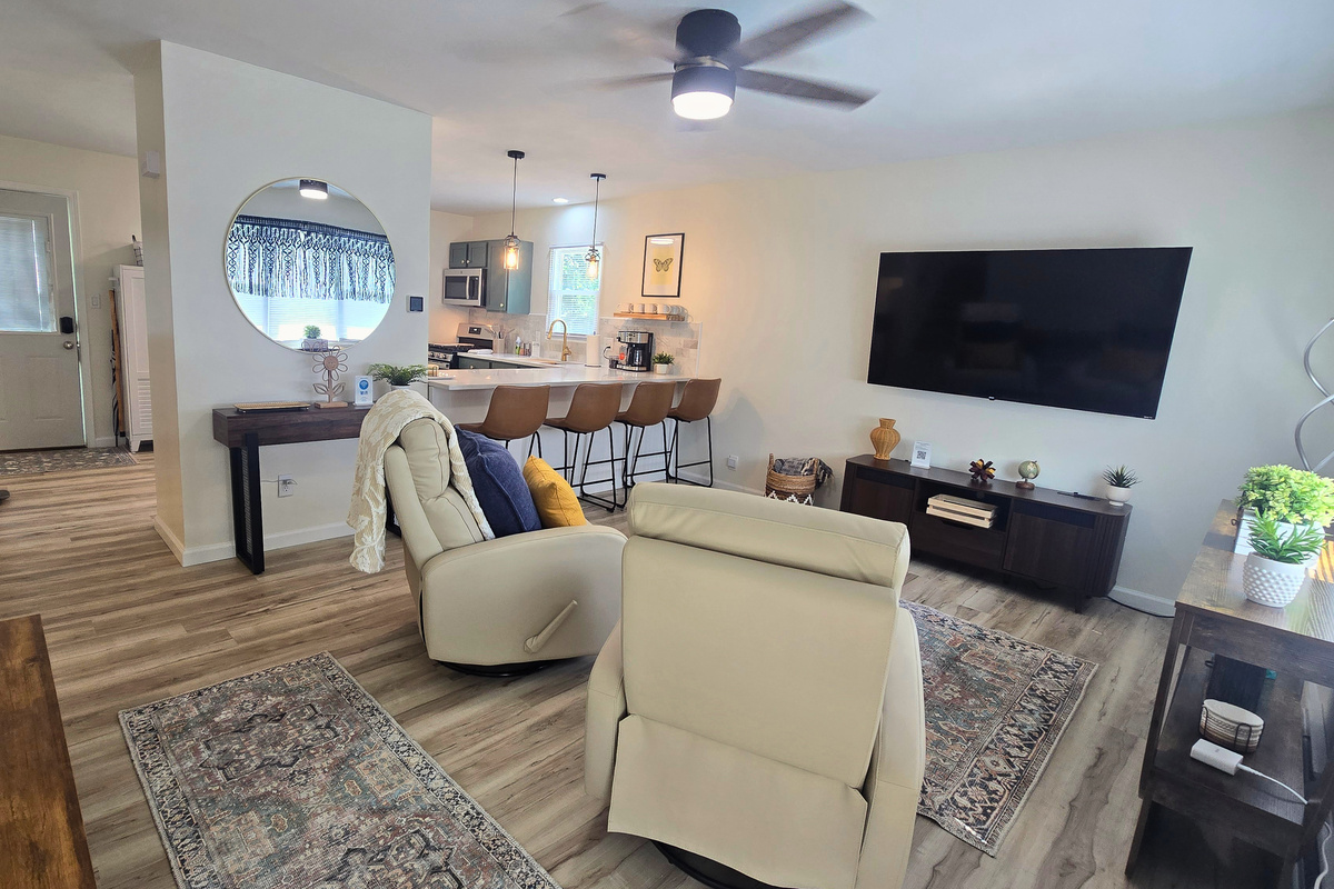 Relax in comfortable swivel recliners while the cook never misses the action.