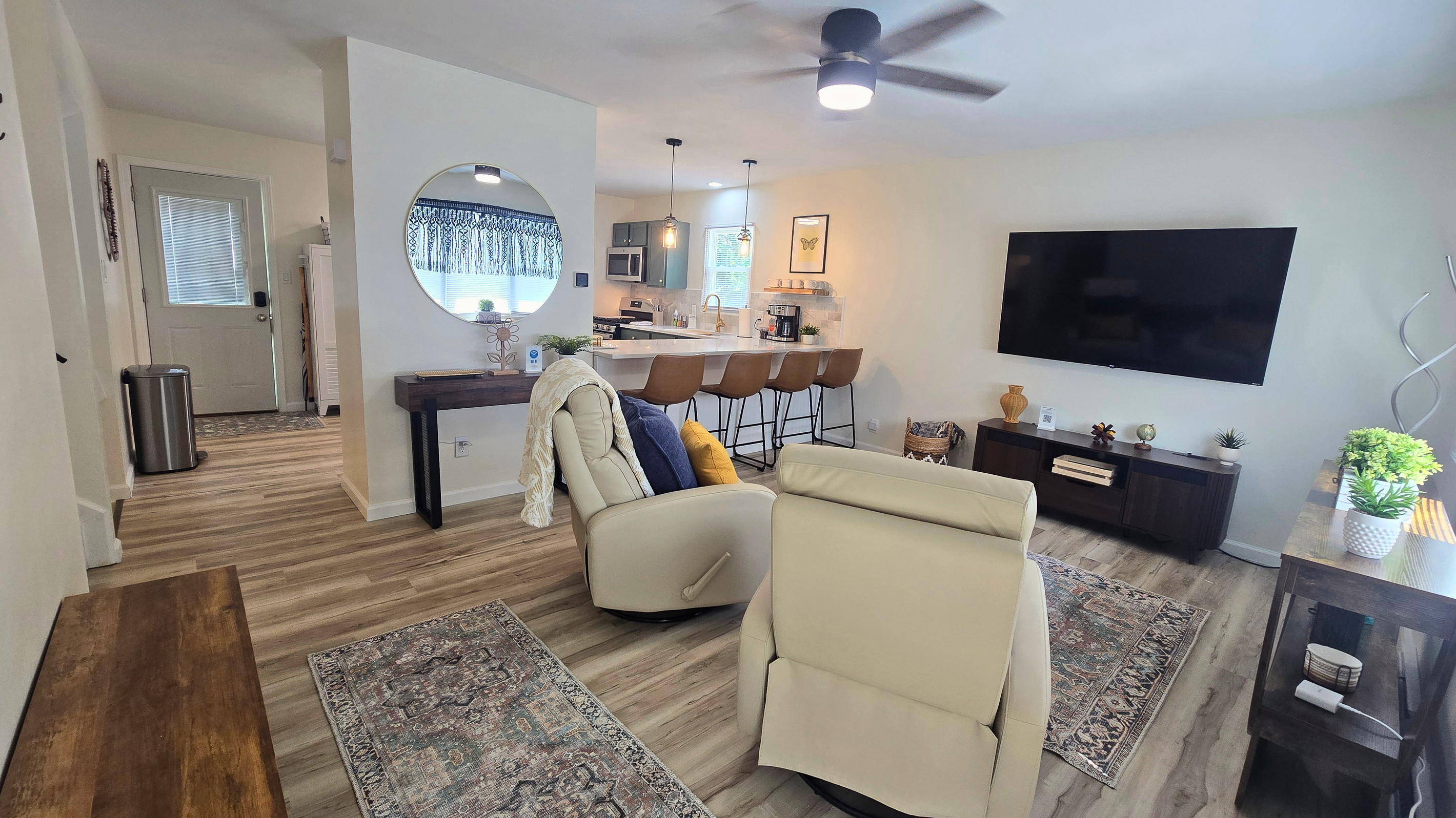 Relax in comfortable swivel recliners while the cook never misses the action.